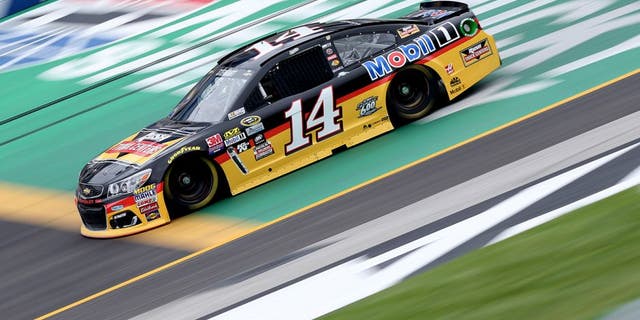 SPARTA, KY - JULY 08: Tony Stewart, driver of the #14 Rush Truck Centers/Mobil 1 Chevrolet, practices for the NASCAR Sprint Cup Series Quaker State 400 at Kentucky Speedway on July 8, 2016 in Sparta, Kentucky. (Photo by Jerry Markland/Getty Images)