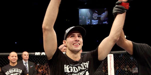 HALIFAX, NS - OCTOBER 4: Rory MacDonald of Canada celebrates after defeating Tarec Saffiedine of Belgium in their welterweight bout at the Scotiabank Centre on October 4, 2014 in Halifax, Nova Scotia, Canada. (Photo by Nick Laham/Zuffa LLC/Zuffa LLC via Getty Images)