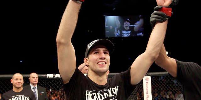 HALIFAX, NS - OCTOBER 4: Rory MacDonald of Canada celebrates after defeating Tarec Saffiedine of Belgium in their welterweight bout at the Scotiabank Centre on October 4, 2014 in Halifax, Nova Scotia, Canada. (Photo by Nick Laham/Zuffa LLC/Zuffa LLC via Getty Images)