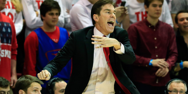 Dec 8, 2015; Dallas, TX, USA; Southern Methodist Mustangs associate head coach Tim Jankovich on the bench against the Michigan Wolverines during the second half at Moody Coliseum. Southern Methodist won 82-58. Mandatory Credit: Ray Carlin-USA TODAY Sports