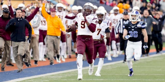 Dec 27, 2014; El Paso, TX, USA; Arizona State Sun Devils running back Kalen Ballage (9) returns a 96 yard kickoff against the Duke Blue Devils in the 2014 Sun Bowl at Sun Bowl Stadium. Mandatory Credit: Ivan Pierre Aguirre-USA TODAY Sports