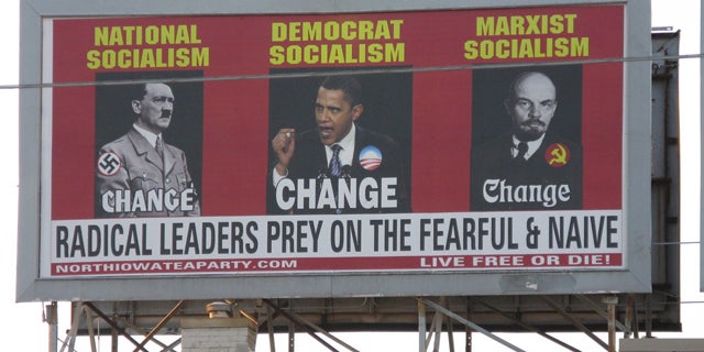 July 13: A billboard ordered and paid for by the North Iowa Tea Party shows President Obama, Adolf Hitler, left, and Vladimir Lenin, on South Federal Avenue in Mason City, Iowa.
