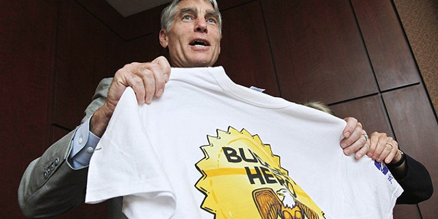 July 13: Sen. Mark Udall, D-Colo., shows his Budget Hero shirt at the Wilson Center's re-launching of the "Budget Game" on Capitol Hill in Washington.
