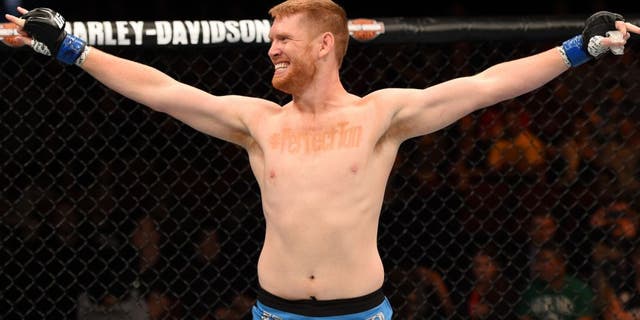 ADELAIDE, AUSTRALIA - MAY 10: Sam Alvey celebrates his knock out victory over Daniel Kelly in their middleweight bout during the UFC Fight Night event at the Adelaide Entertainment Centre on May 10, 2015 in Adelaide, Australia. (Photo by Josh Hedges/Zuffa LLC/Zuffa LLC via Getty Images)