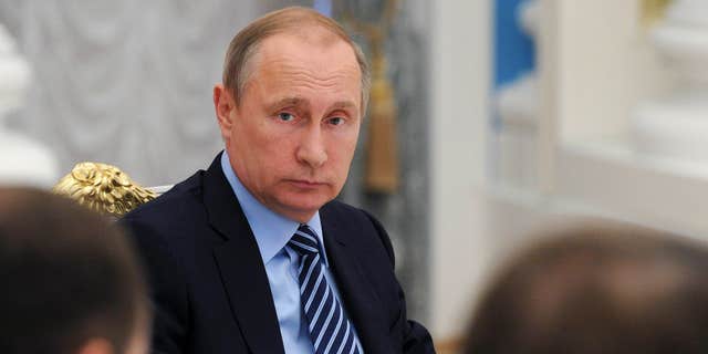 13 июня 2016 г.: Президент России Владимир Путин принимает участие в заседании Президентского совета в Кремле, Москва, Россия.