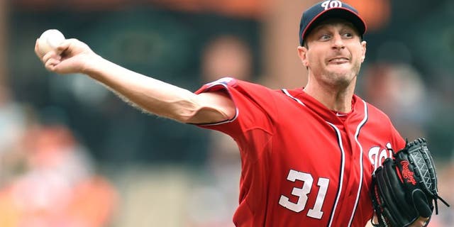 BALTIMORE, MD - JULY 12: Max Scherzer #31 of the Washington Nationals pitches in the first inning during a baseball game against the Baltimore Orioles at Oriole Park at Camden Yards on July 12, 2015 in Baltimore, Maryland. (Photo by Mitchell Layton/Getty Images)
