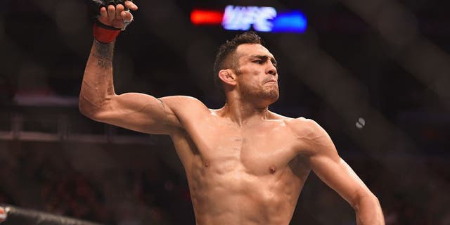 LOS ANGELES, CA - FEBRUARY 28: Tony Ferguson celebrates after defeating Gleison Tibau in their lightweight bout during the UFC 184 event at Staples Center on February 28, 2015 in Los Angeles, California. (Photo by Jeff Bottari/Zuffa LLC/Zuffa LLC via Getty Images)