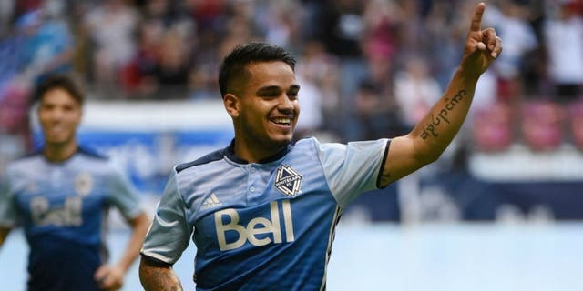 Jul 13, 2016; Vancouver, British Columbia, CAN; Vancouver Whitecaps midfielder Cristian Techera (13) celebrates a goal against Real Salt Lake goalkeeper Jeff Attinella (not pictured) during the first half at BC Place. Mandatory Credit: Anne-Marie Sorvin-USA TODAY Sports