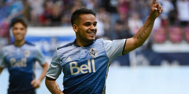 Jul 13, 2016; Vancouver, British Columbia, CAN; Vancouver Whitecaps midfielder Cristian Techera (13) celebrates a goal against Real Salt Lake goalkeeper Jeff Attinella (not pictured) during the first half at BC Place. Mandatory Credit: Anne-Marie Sorvin-USA TODAY Sports