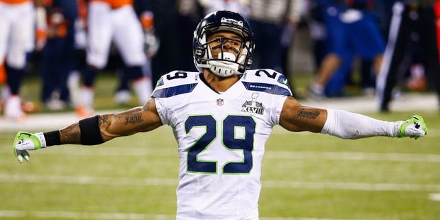 EAST RUTHERFORD, NJ - FEBRUARY 02: Free safety Earl Thomas #29 of the Seattle Seahawks gestures during the second quarter Super Bowl XLVIII at MetLife Stadium on February 2, 2014 in East Rutherford, New Jersey. (Photo by Tom Pennington/Getty Images)
