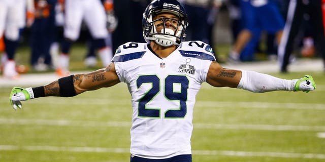 EAST RUTHERFORD, NJ - FEBRUARY 02: Free safety Earl Thomas #29 of the Seattle Seahawks gestures during the second quarter Super Bowl XLVIII at MetLife Stadium on February 2, 2014 in East Rutherford, New Jersey. (Photo by Tom Pennington/Getty Images)