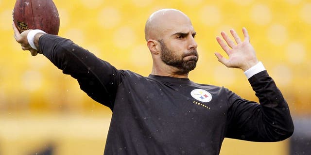 Nov 17, 2013; Pittsburgh, PA, USA; Pittsburgh Steelers quarterback Bruce Gradkowski (5) warms-up on the field before playing the Detroit Lions at Heinz Field. Mandatory Credit: Charles LeClaire-USA TODAY Sports