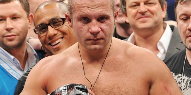 ANAHEIM, CA - JANUARY 24: Affliction Fedor Emelianenko celebrates after defeating Andrei Arlovski in the first round during their Heavyweight bout at "Affliction M-1 Global Day of Reckoning" at the Honda Center on January 24, 2009 in Anaheim, California. (Photo by Jon Kopaloff/Getty Images) *** Local Caption *** Fedor Emelianenko