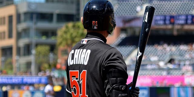 Jun 15, 2016; San Diego, CA, USA; Miami Marlins center fielder Ichiro Suzuki (51) on deck during the seventh inning against the San Diego Padres at Petco Park. Mandatory Credit: Jake Roth-USA TODAY Sports