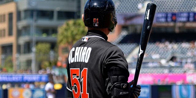 Jun 15, 2016; San Diego, CA, USA; Miami Marlins center fielder Ichiro Suzuki (51) on deck during the seventh inning against the San Diego Padres at Petco Park. Mandatory Credit: Jake Roth-USA TODAY Sports
