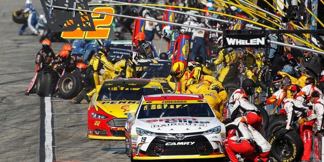 Carl Edwards, driver of the #19 Sport Clips Toyota, pits during the NASCAR Sprint Cup Series SYLVANIA 300 at New Hampshire Motor Speedway on September 27, 2015 in Loudon, New Hampshire.