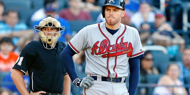 NEW YORK, NY - JUNE 13: Freddie Freeman #5 of the Atlanta Braves in action against the New York Mets at Citi Field on June 13, 2015 in the Flushing neighborhood of the Queens borough of New York City. The Braves defeated the Mets 5-3 in eleven innings. (Photo by Jim McIsaac/Getty Images)