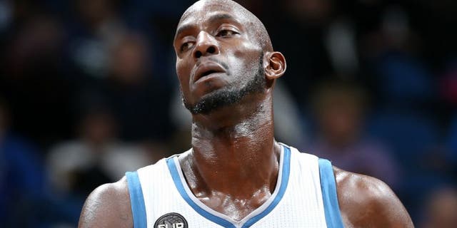 MINNEAPOLIS, MN - JANUARY 17: Kevin Garnett #21 of the Minnesota Timberwolves looks on during the game against the Phoenix Suns on January 17, 2016 at Target Center in Minneapolis, Minnesota. NOTE TO USER: User expressly acknowledges and agrees that, by downloading and or using this Photograph, user is consenting to the terms and conditions of the Getty Images License Agreement. Mandatory Copyright Notice: Copyright 2016 NBAE (Photo by David Sherman/NBAE via Getty Images)