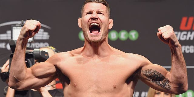 GLASGOW, SCOTLAND - JULY 17: Michael Bisping of England steps on the scale during the UFC weigh-in inside the SSE Hydro on July 17, 2015 in Glasgow, Scotland. (Photo by Josh Hedges/Zuffa LLC/Zuffa LLC via Getty Images)