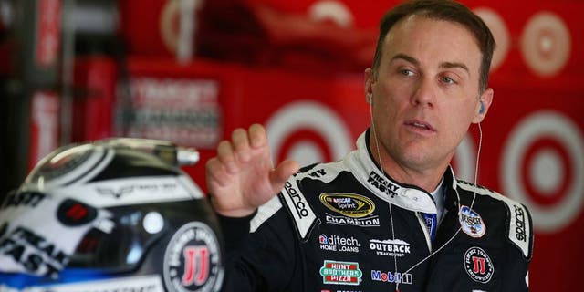 LOUDON, NH - JULY 15: Kevin Harvick, driver of the #4 Jimmy John's Chevrolet, stands in the garage area during practice for the NASCAR Sprint Cup Series New Hampshire 301 at New Hampshire Motor Speedway on July 16, 2016 in Loudon, New Hampshire. (Photo by Sarah Crabill/NASCAR via Getty Images)
