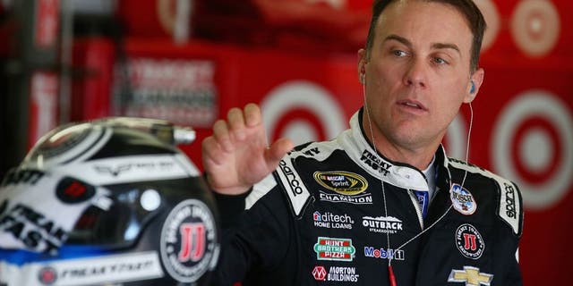 LOUDON, NH - JULY 15: Kevin Harvick, driver of the #4 Jimmy John's Chevrolet, stands in the garage area during practice for the NASCAR Sprint Cup Series New Hampshire 301 at New Hampshire Motor Speedway on July 16, 2016 in Loudon, New Hampshire. (Photo by Sarah Crabill/NASCAR via Getty Images)