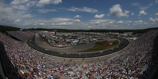 Drivers race during the NASCAR Sprint Cup Series 5-Hour ENERGY 301 at New Hampshire Motor Speedway on July 19, 2015 in Loudon, New Hampshire.
