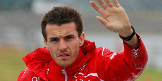 Oct. 5, 2014: Marussia driver Jules Bianchi of France waves during drivers' parade before the Japanese Formula One Grand Prix at the Suzuka Circuit in Suzuka, central Japan.