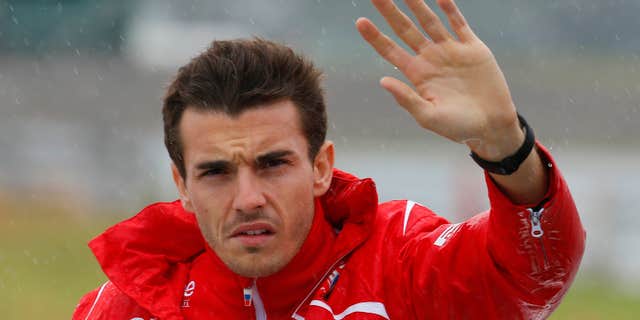 Oct. 5, 2014: Marussia driver Jules Bianchi of France waves during drivers' parade before the Japanese Formula One Grand Prix at the Suzuka Circuit in Suzuka, central Japan.