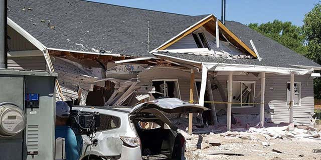 This July 14, 2016 photo provided by Dennis Sanders shows a house in Panaca, Nev. after it was destroyed by explosives.