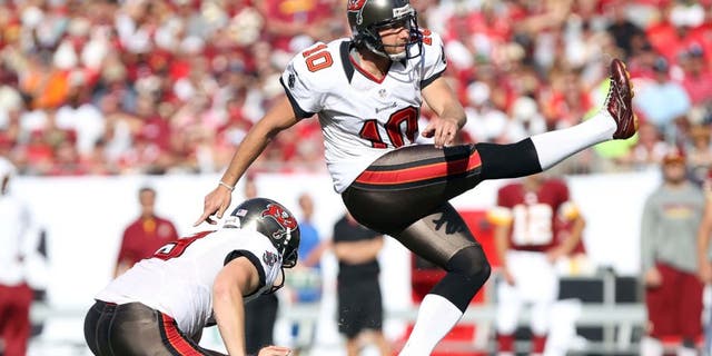 September 30, 2012; Tampa, FL, USA; Tampa Bay Buccaneers kicker Connor Barth (10) kicks a field goal during the first quarter against the Washington Redskins at Raymond James Stadium. Mandatory Credit: Kim Klement-USA TODAY Sports