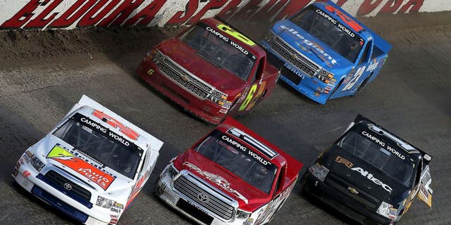ROSSBURG, OH - JULY 22: Ken Schrader, driver of the #52 Federated Auto Parts Toyota, leads a group of cars during qualifying races for the NASCAR Camping World Truck Series 3rd Annual 1-800-Car-Cash Mud Summer Classic at Eldora Speedway on July 22, 2015 in Rossburg, Ohio. (Photo by Sean Gardner/NASCAR via Getty Images)