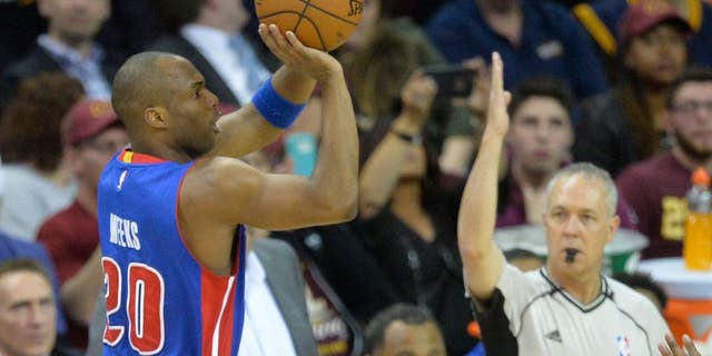 Apr 13, 2016; Cleveland, OH, USA; Detroit Pistons guard Jodie Meeks (20) attempts a three-point basket in the second quarter against the Cleveland Cavaliers at Quicken Loans Arena. Mandatory Credit: David Richard-USA TODAY Sports