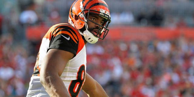 Nov 30, 2014; Tampa, FL, USA; Cincinnati Bengals tight end Jermaine Gresham (84) points against the Tampa Bay Buccaneers during the second half at Raymond James Stadium. Cincinnati Bengals defeated the Tampa Bay Buccaneers 14-13. Mandatory Credit: Kim Klement-USA TODAY Sports