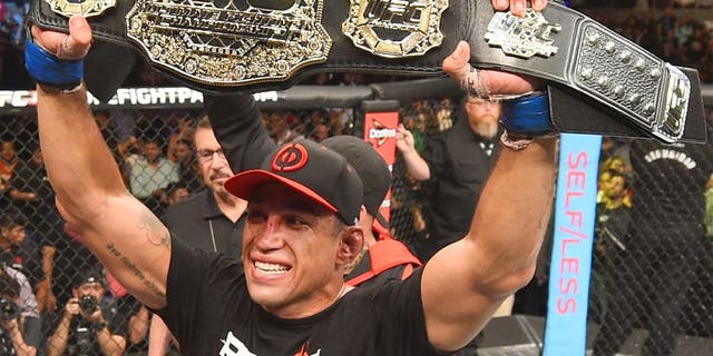 MEXICO CITY, MEXICO - JUNE 13: Fabricio Werdum of Brazil celebrates his submission victory over Cain Velasquez of the United States in their UFC heavyweight championship bout during the UFC 188 event inside the Arena Ciudad de Mexico on June 13, 2015 in Mexico City, Mexico. (Photo by Josh Hedges/Zuffa LLC/Zuffa LLC via Getty Images)