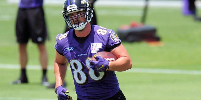 May 28, 2015; Baltimore, MD, USA; Baltimore Ravens tight end Dennis Pitta (88) runs with the ball during training camp at the Under Armour Performance Center. Mandatory Credit: Evan Habeeb-USA TODAY Sports
