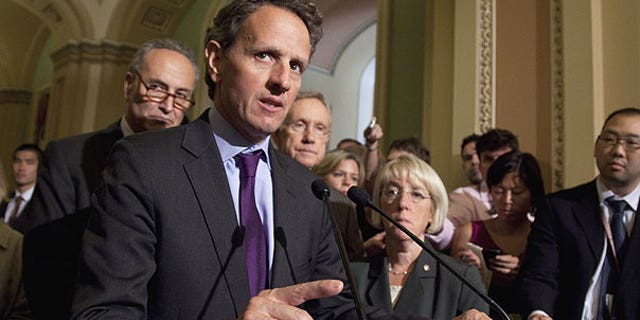 July 14: Treasury Secretary Timothy Geithner, second from left, makes remarks after a meeting with Democrats about the debt limit on Capitol Hill in Washington.