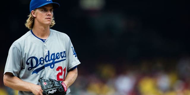 WASHINGTON, DC - JULY 19: Starting pitcher Zack Greinke #21 of the Los Angeles Dodgers prepares to throw a pitch to a Washington Nationals batter in the fourth inning of a baseball game at Nationals Park on July 19, 2015 in Washington, DC. (Photo by Patrick McDermott/Washington Nationals/Getty Images)
