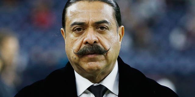 HOUSTON, TX - DECEMBER 28: Shahid Khan, the billionaire owner of the Jacksonville Jaguars, waits on the field before their game against the Houston Texans at NRG Stadium on December 28, 2014 in Houston, Texas. (Photo by Scott Halleran/Getty Images)