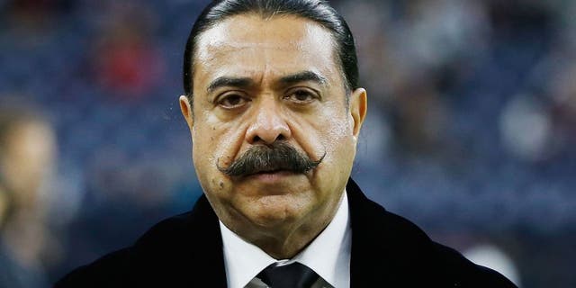 HOUSTON, TX - DECEMBER 28: Shahid Khan, the billionaire owner of the Jacksonville Jaguars, waits on the field before their game against the Houston Texans at NRG Stadium on December 28, 2014 in Houston, Texas. (Photo by Scott Halleran/Getty Images)