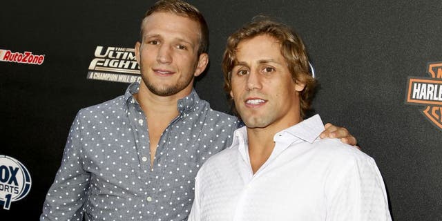 HOLLYWOOD, CA - SEPTEMBER 09: (L-R) TJ Dillashaw and Urijah Faber attend FOX Sports 1's 'The Ultimate Fighter' season premiere party at Lure on September 9, 2014 in Hollywood, California. (Photo by Tibrina Hobson/WireImage)