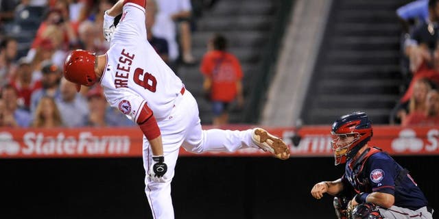 July 22, 2015; Anaheim, CA, USA; Los Angeles Angels third baseman David Freese (6) reacts after being hit by pitch in the fourth inning against the Minnesota Twins at Angel Stadium of Anaheim. Mandatory Credit: Gary A. Vasquez-USA TODAY Sports