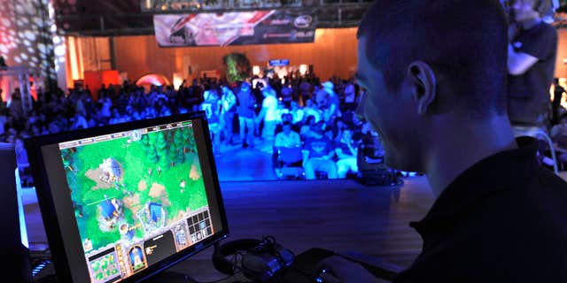 Aug 7, 2009: a participant plays a computer game during the Intel Friday Night Game, a competition of the ESL, Electronic Sports League, in Dresden, Germany.