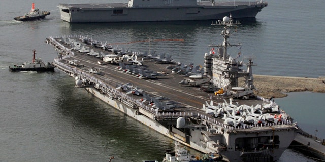 July 25: The USS George Washington, a nuclear-powered U.S. supercarrier, leaves for joint military exercises at the Busan port in Soth Korea.