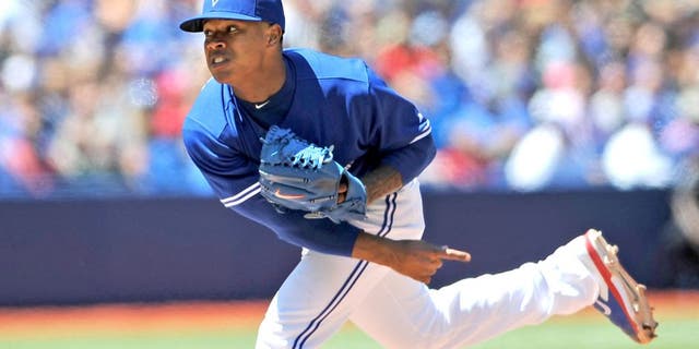 Jul 24, 2014; Toronto, Ontario, CAN; Toronto Blue Jays starting pitcher Marcus Stroman delivers a pitch during the Jays 8-0 win over Boston Red Sox at Rogers Centre. Mandatory Credit: Dan Hamilton-USA TODAY Sports