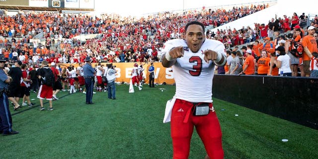 Aug 31, 2013; Corvallis, OR, USA; Eastern Washington Eagles quarterback Vernon Adams (3) celebrates with fans after defeating the Oregon State Beavers 49-46 at Reser Stadium. Mandatory Credit: Jaime Valdez-USA TODAY Sports