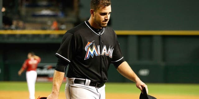 PHOENIX, AZ - JULY 22: Starting pitcher Jose Fernandez #16 of the Miami Marlins walks to the dugout following the sixth inning of the MLB game against the Arizona Diamondbacks at Chase Field on July 22, 2015 in Phoenix, Arizona. (Photo by Christian Petersen/Getty Images)