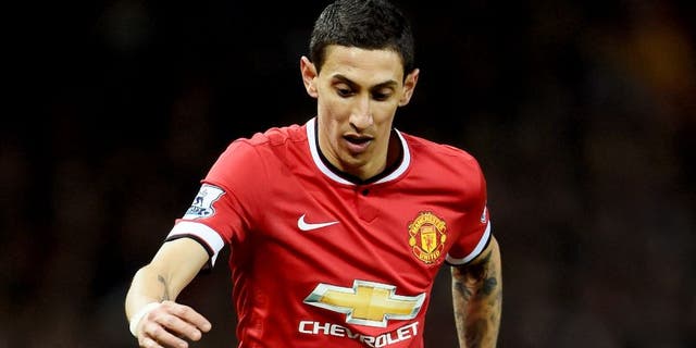 MANCHESTER, ENGLAND - MARCH 09: Angel di Maria of Manchester United controls the ball during the FA Cup Quarter Final match between Manchester United and Arsenal at Old Trafford on March 9, 2015 in Manchester, England. (Photo by Laurence Griffiths/Getty Images)