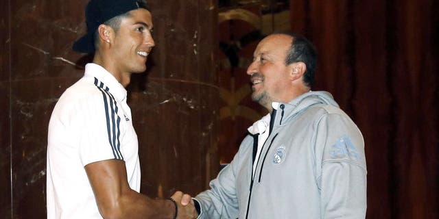 MELBOURNE, AUSTRALIA - JULY 13: Head coach Rafa Benitez (R) Cristiano Ronaldo greets the arrival of the hotel. Real Madrid Arrive In Melbourne For The Start Of Their Pre-Season Tour on July 13, 2015 in Melbourne, Australia. (Photo by Helios de la Rubia/Real Madrid via Getty Images)
