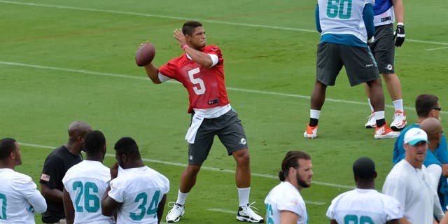 May 26, 2015; Miami, FL, USA; Miami Dolphins quarterback Josh Freeman (5) during practice drills at Miami Dolphins Training Facility. Mandatory Credit: Steve Mitchell-USA TODAY Sports