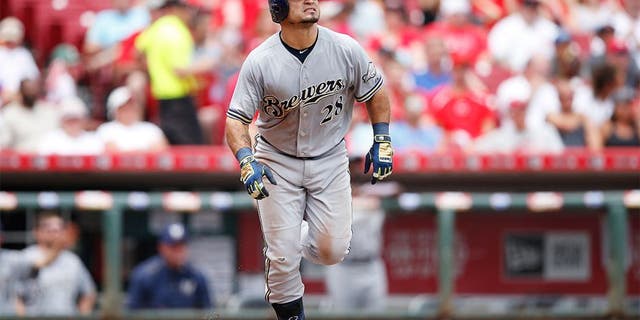 CINCINNATI, OH - JULY 5: Gerardo Parra #28 of the Milwaukee Brewers watches his solo home run in the seventh inning against the Cincinnati Reds at Great American Ball Park on July 5, 2015 in Cincinnati, Ohio. The Brewers defeated the Reds 6-1. (Photo by Joe Robbins/Getty Images)
